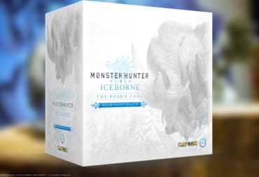 Photograph showing the cover of Monster Hunter World Iceborne: The Board Game with a blurred photo in the background. 